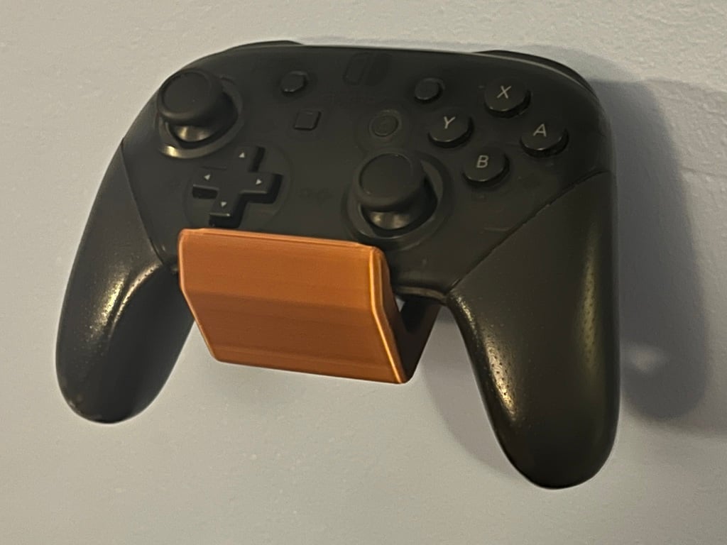 Yleiskäyttöinen ohjaimen seinäteline PlayStationille, Xboxille ja Nintendo Switch Prolle