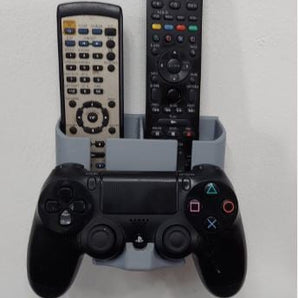 Seinään kiinnitettävä pidike kaukosäätimille ja PS4-ohjaimelle