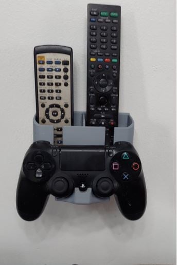 Seinään kiinnitettävä pidike kaukosäätimille ja PS4-ohjaimelle