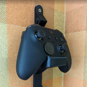 Seinäteline XBOX-ohjaimelle (pinoontaitettavissa)