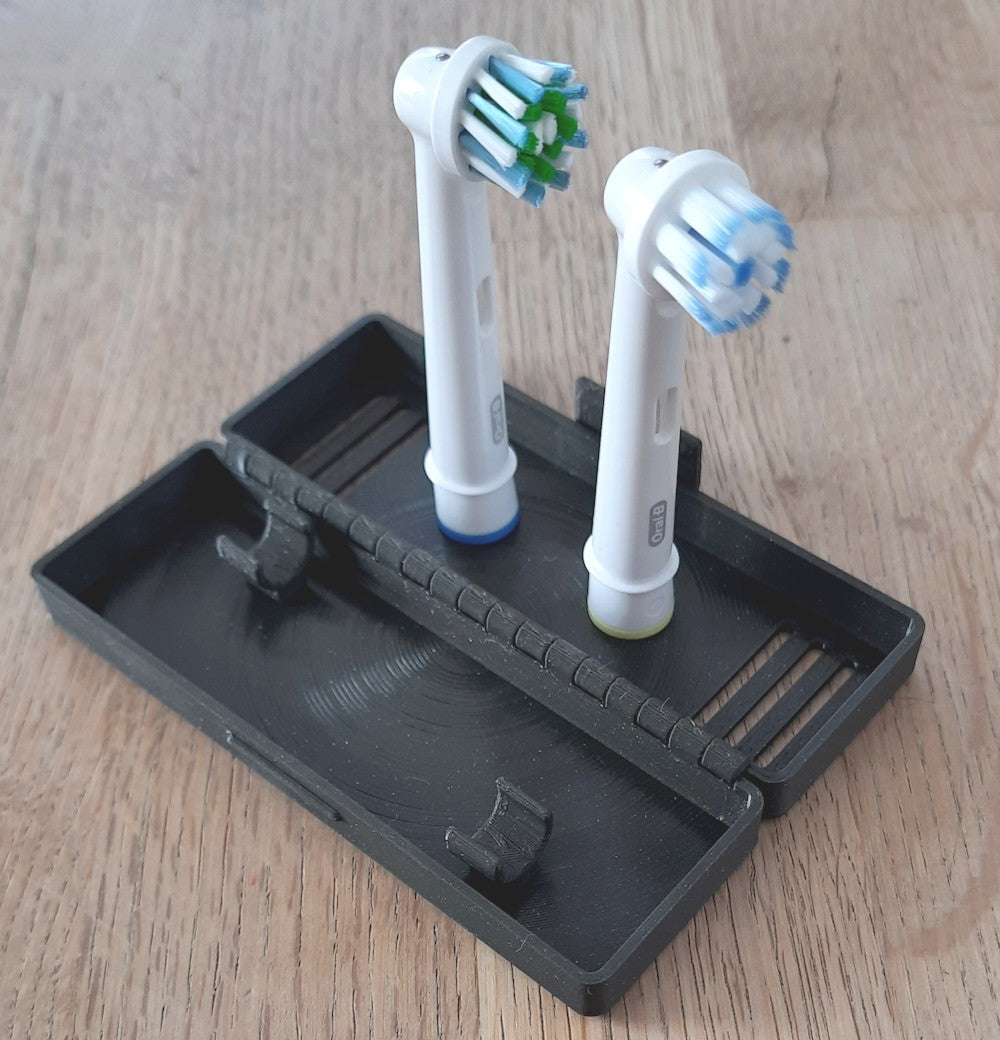 Oral-B-matkalaukku, jossa on jalusta sähköhammasharjan päille