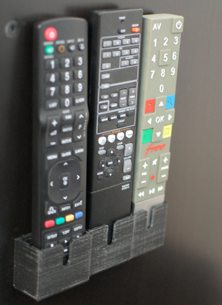 Kaukosäätimen pidike Freebox Revolutionille, LG 42LD420:lle ja Yamaha RX-V367:lle.