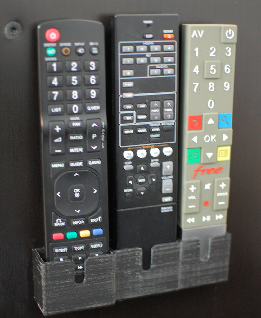 Kaukosäätimen pidike Freebox Revolutionille, LG 42LD420:lle ja Yamaha RX-V367:lle.
