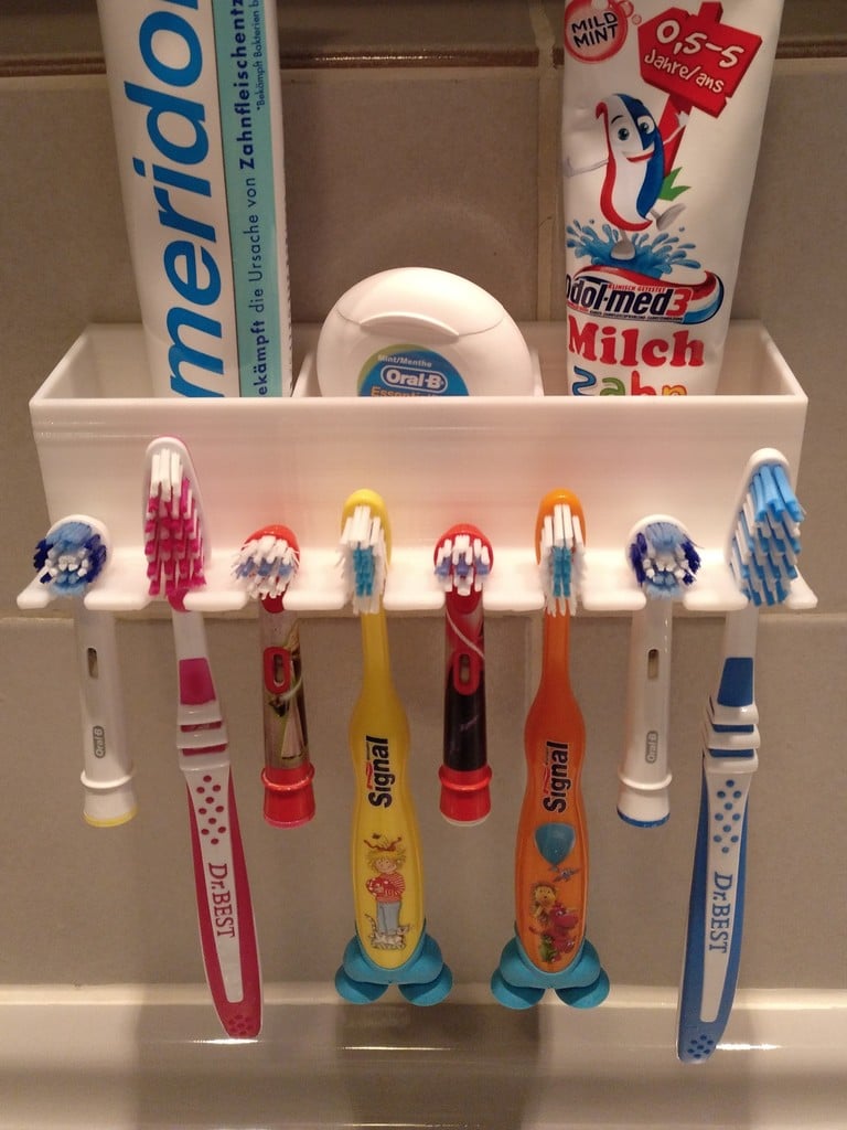 Seinälle kiinnitettävä kylpyhuoneen järjestäjä hammasharjoille ja hammastahnalle