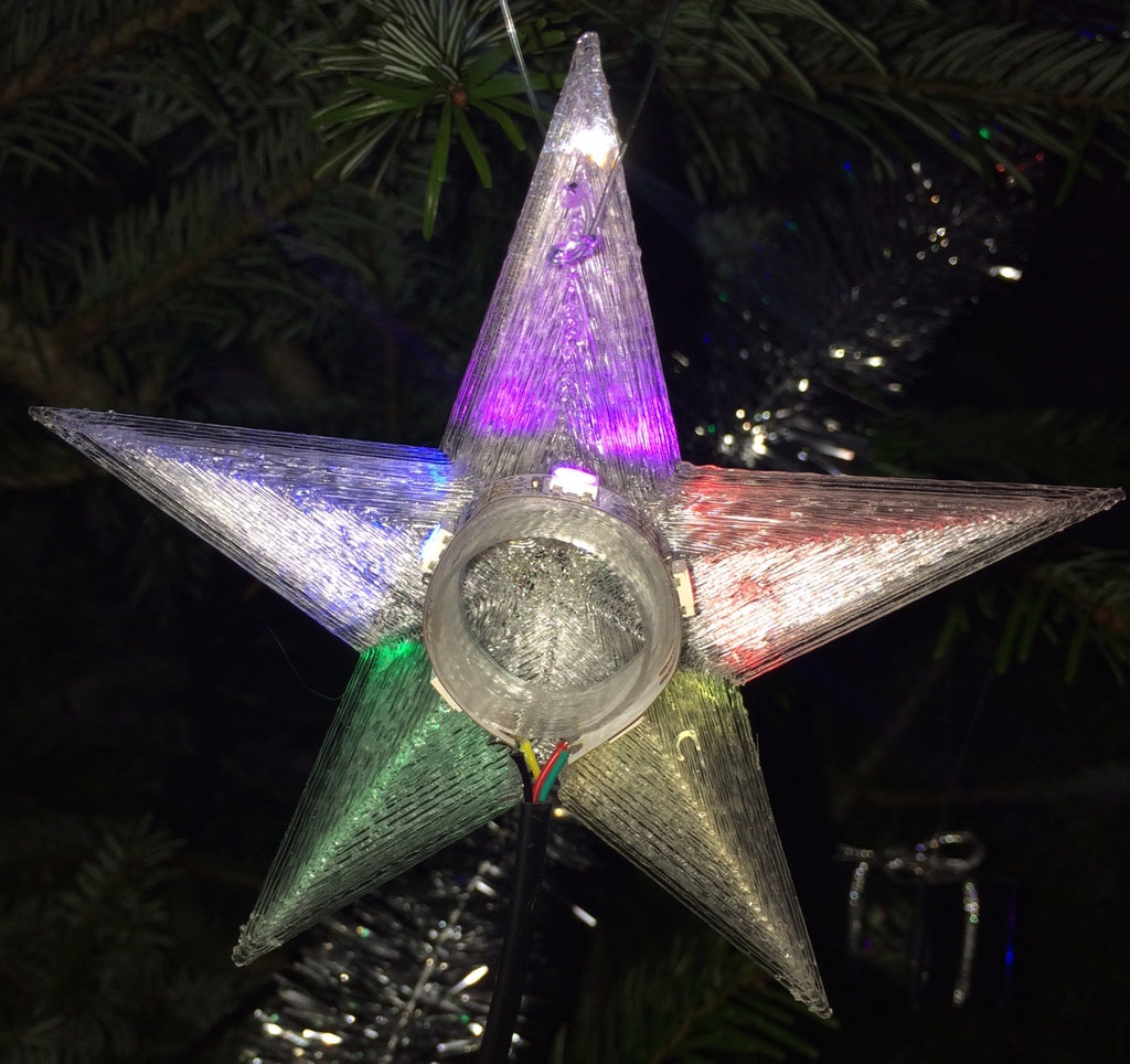 Joulutähti koristeena monivärisellä LED-valolla