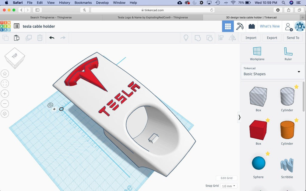 Teslan mobiililaturi ja kaapelipidike logolla ja kirjaimilla (US-versio)