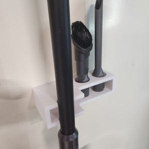 Seinäkiinnike Dyson v7 pölynimurille, jossa säilytystila 2 lisävarusteelle