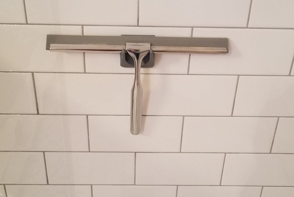 Suihku-kylpyhuoneen vetolastan pidike