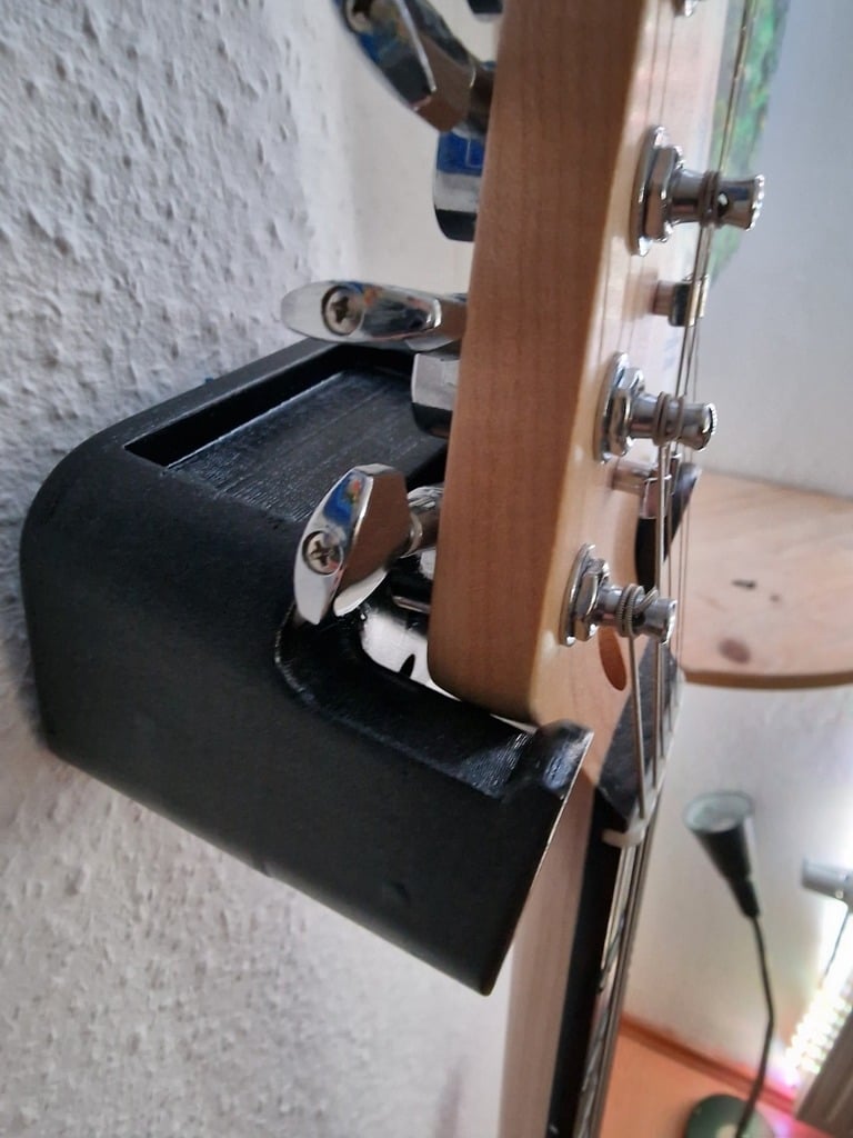 Kitararipustin, jossa tilaa plektrumeille