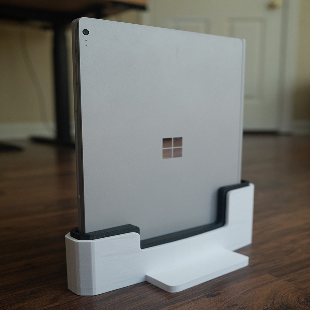 Kannettava teline Surface Bookille, jossa on mahdollisuus mukauttaa
