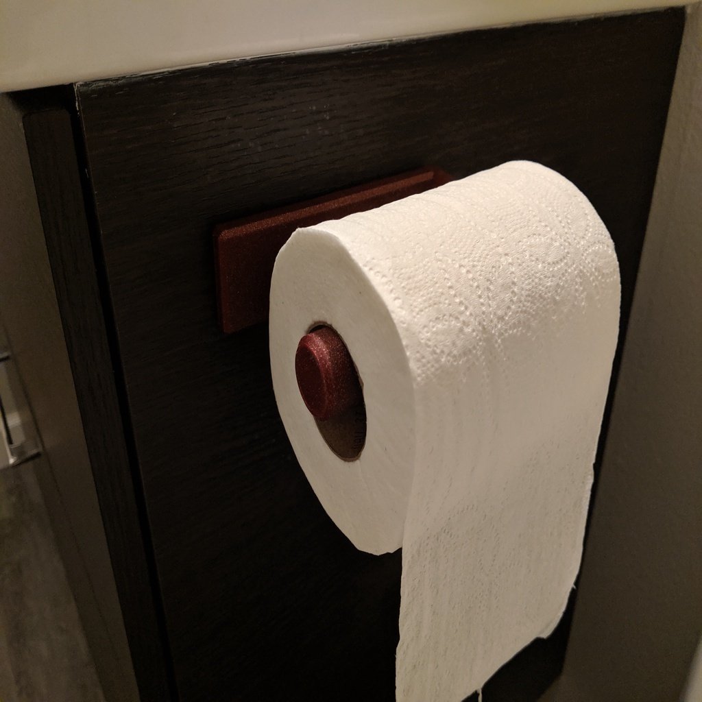 WC-paperiteline asennettuna 3M-komentonauhalla