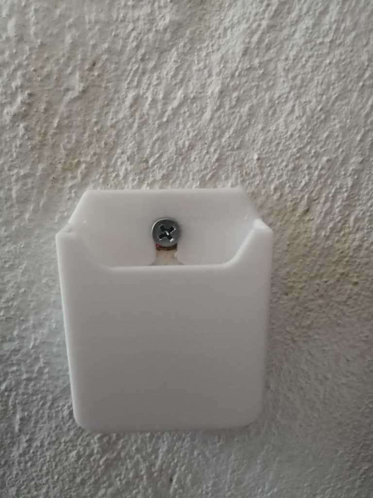 LED-kaukosäätimen pidike seinälle